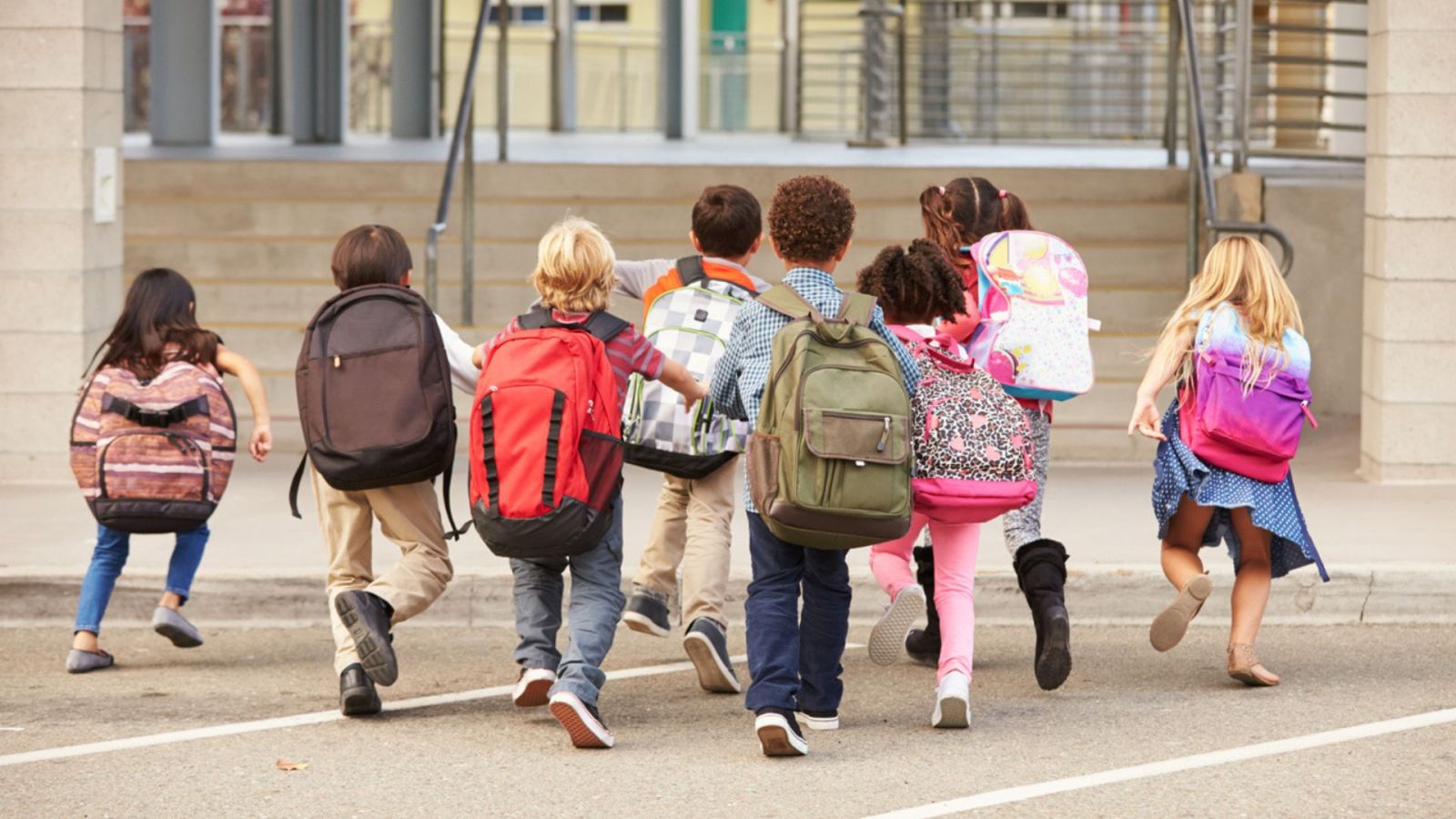 kids wearing back packs